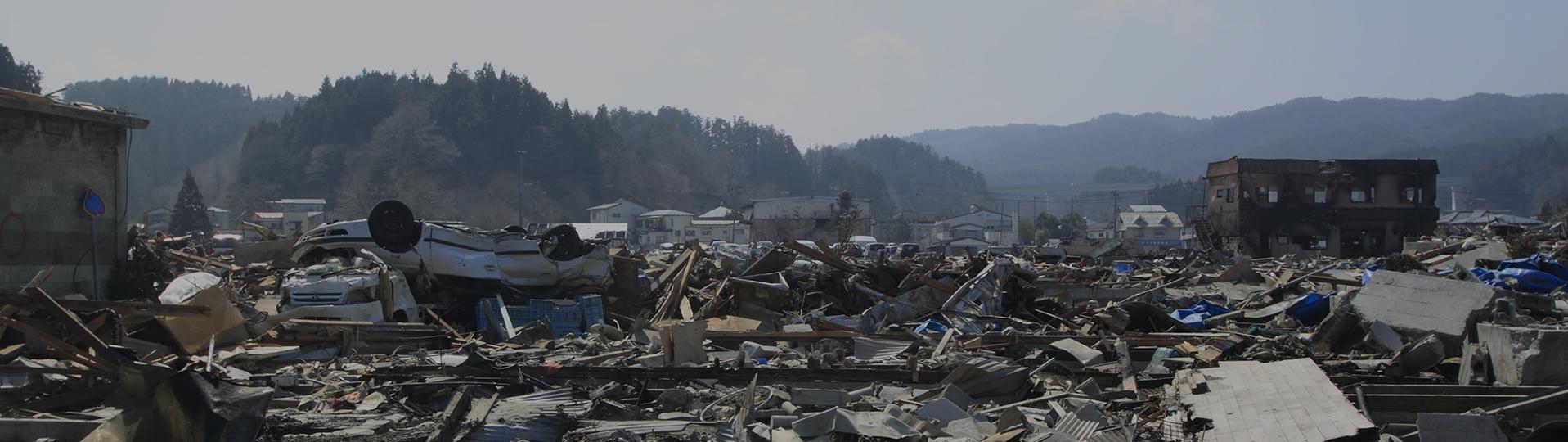 Aftermath of a natural disaster, emphasizing the urgency of humanitarian relief programs like TPS.